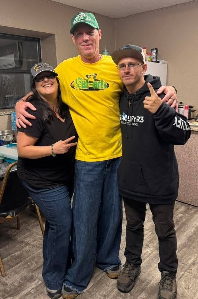 DJ Natural Nate® in The-Lost-Art.com yellow shirt with friends at the Florida underground show May 2026