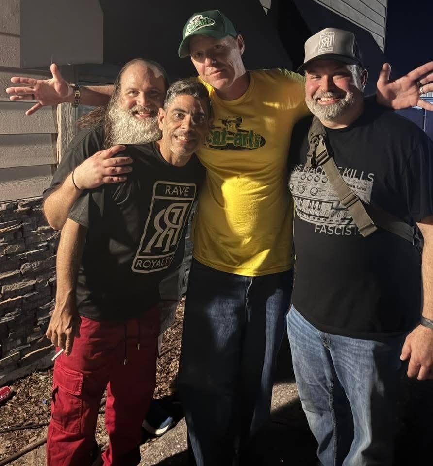 Four people including DJ Natural Nate® outside at the Florida underground show May 2026