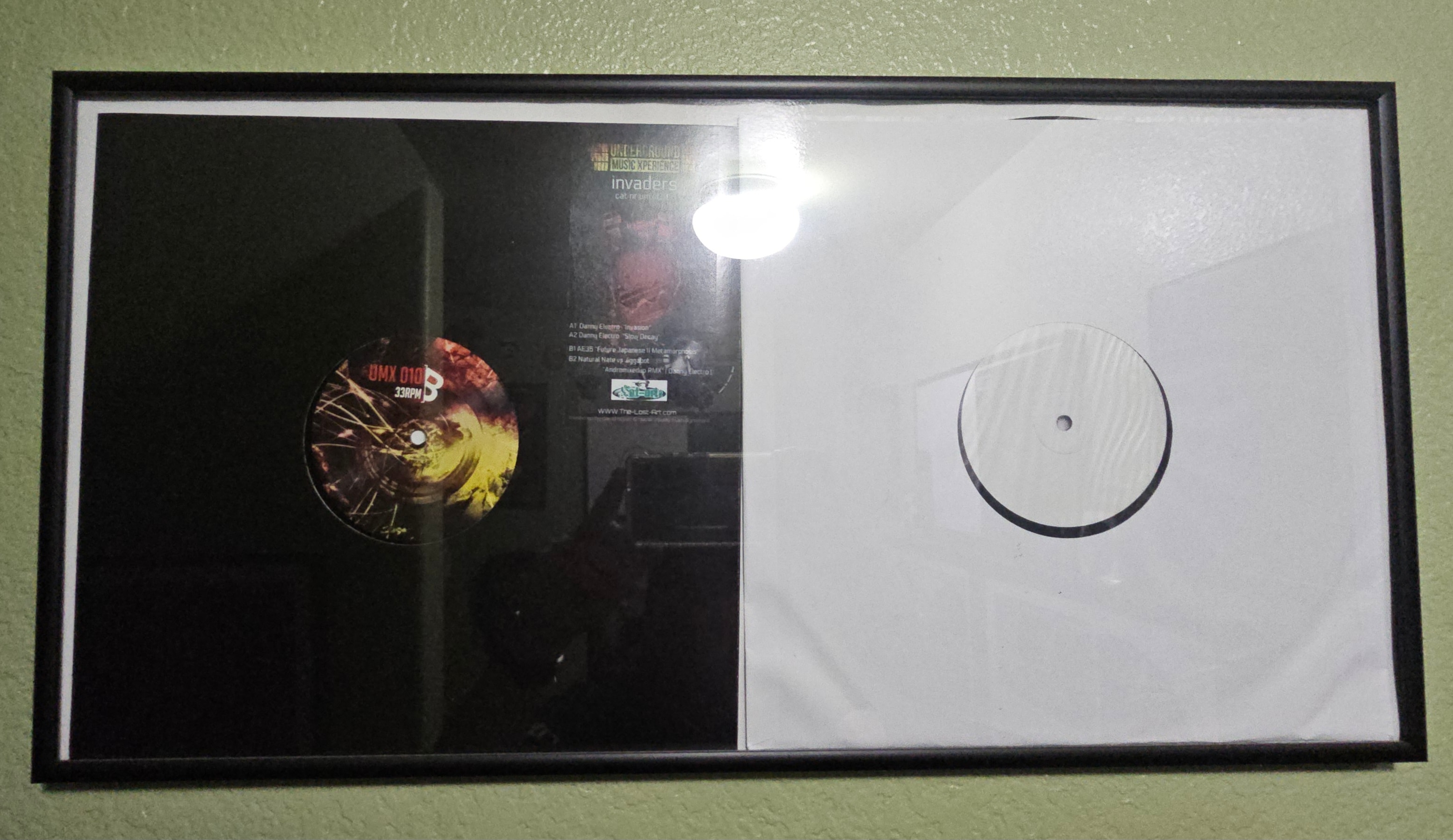 Invaders, UMX 010, framed original vinyl B-side label with The-Lost-Art.com logo, DJ Natural Nate Wall of Fame, Netherlands 2018